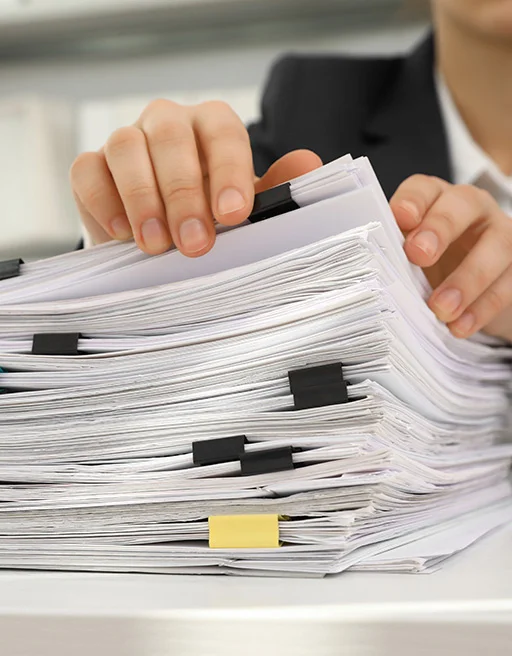 Lawyer Sorting Through Corporate Law Documents